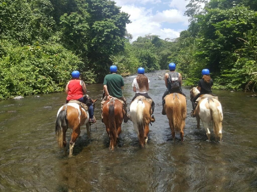 A family horseback ride in Costa Rica