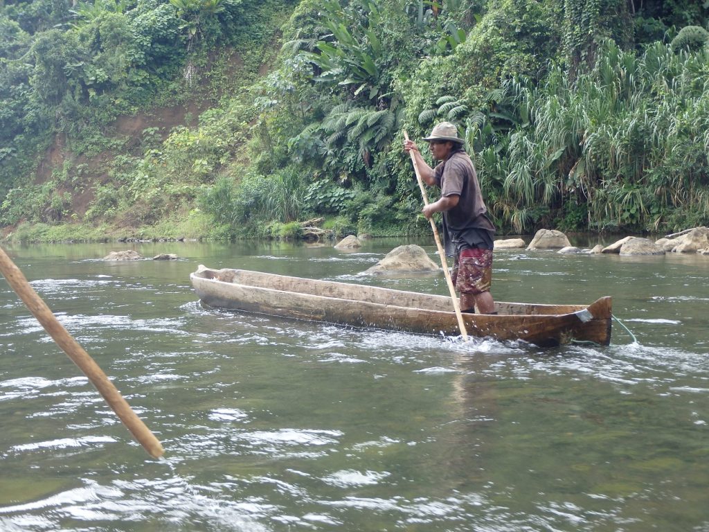 Traditional canoe guided by a Bribri tribe member.